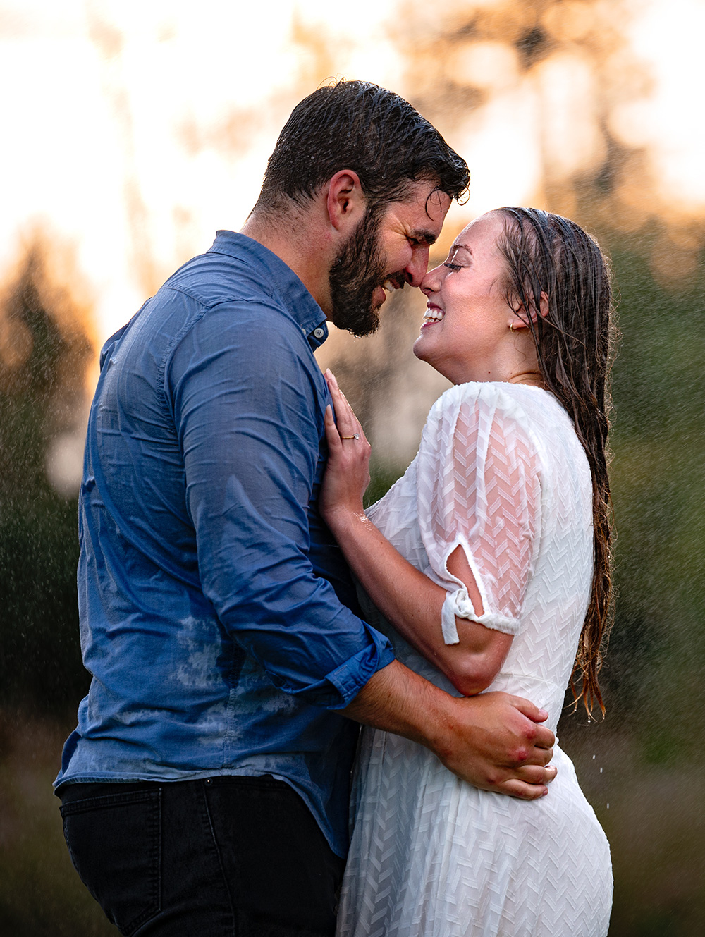 engagement shoot with couple in rain